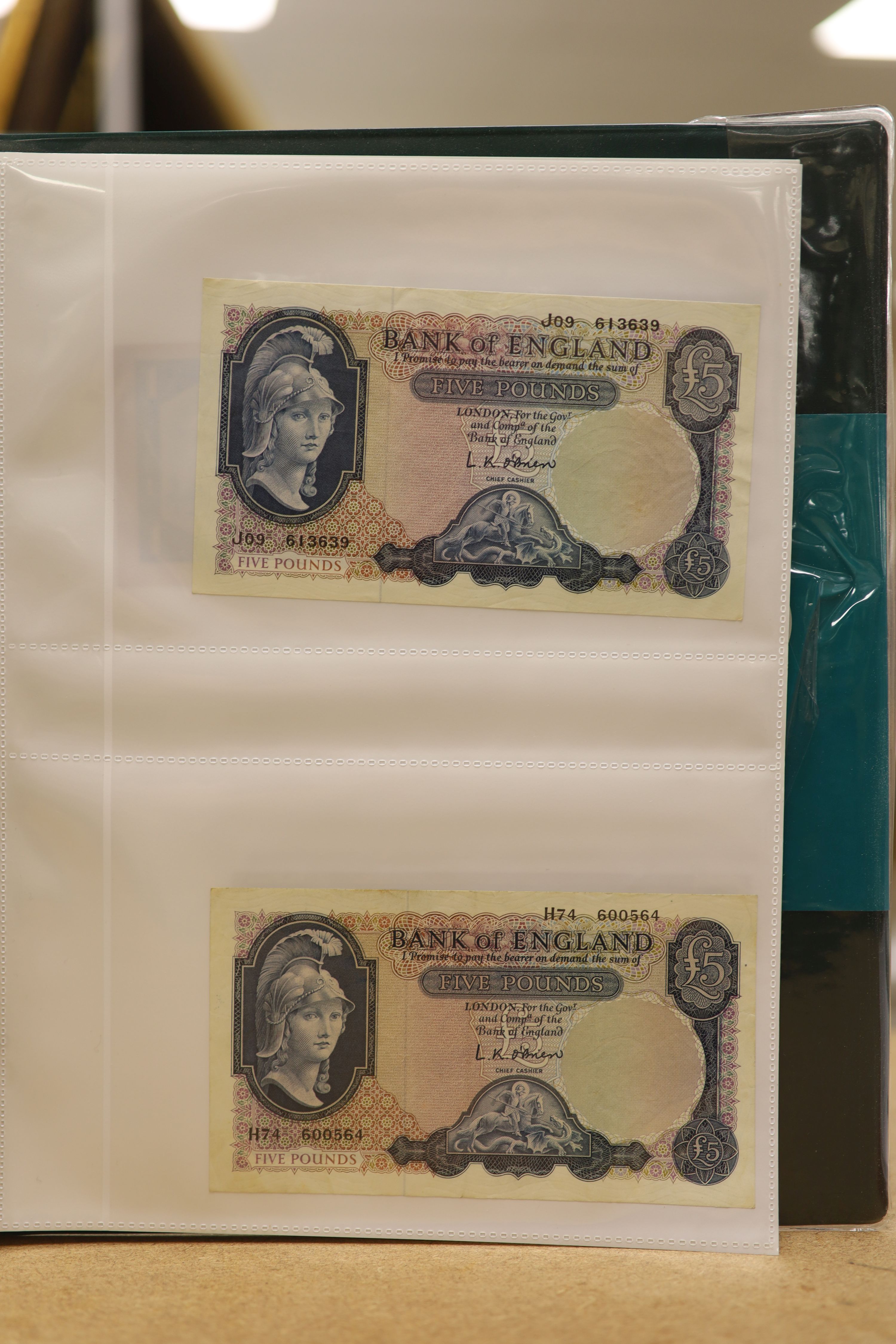 A collection of Bank of England and Scottish banknotes to include: 21 QEII 10 shillings, 14 O'Brien and Beale 10 shillings, 1 Peppiatt 10 shillings, 4 Hallam one pound notes, 18 O'Brien or Beale one pound notes, 8 Peppia